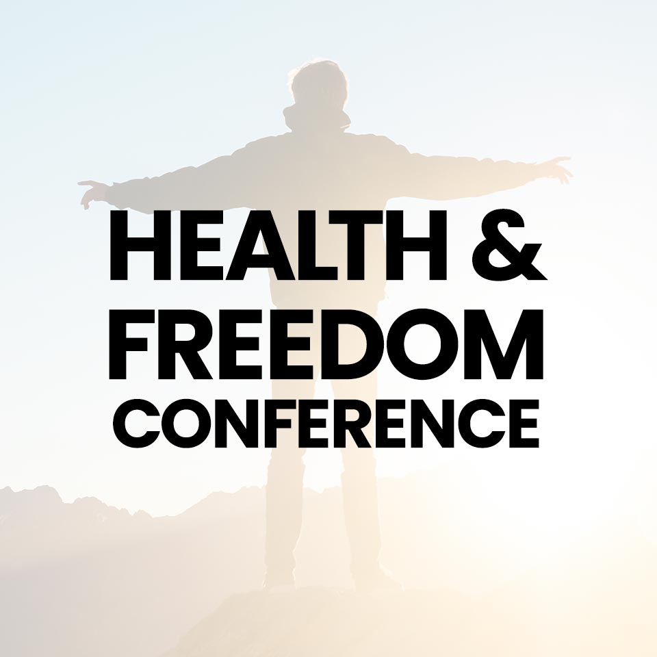 Health & Freedom Conference Logo With Background Of Man In Hoodie Facing The Sunrise With Arms Open.